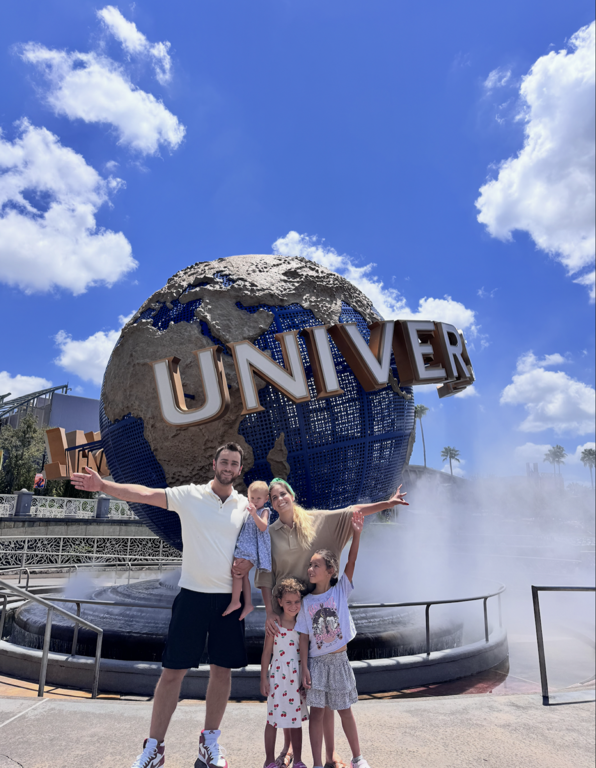 David Gahnassia with his wife and three daughters at Universal Studios, Florida — August 2025
